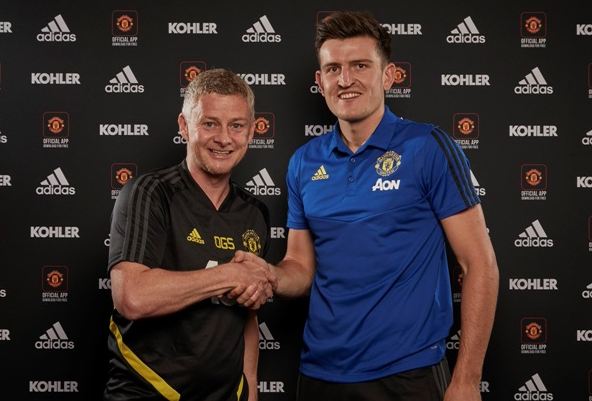 Harry Maguire and Ole Gunnar Solskjaer Manchester United